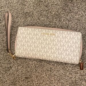 Pink and white michael kors writlet